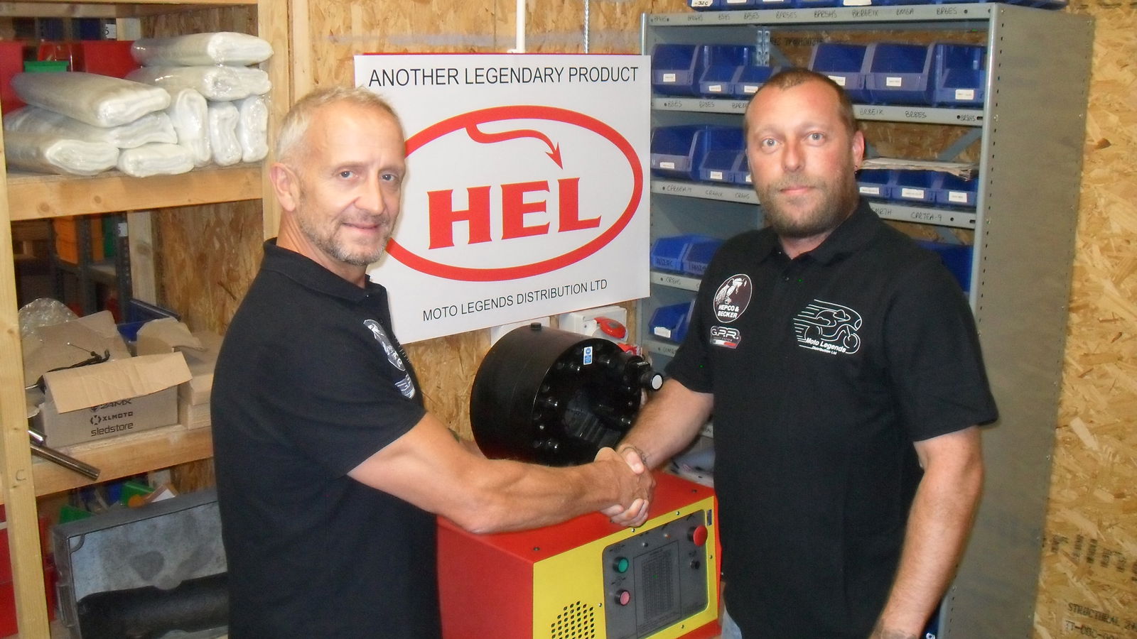 Arthur Macdonald and Steve Garfoot shake hands over HEL Performance distribution rights deal.